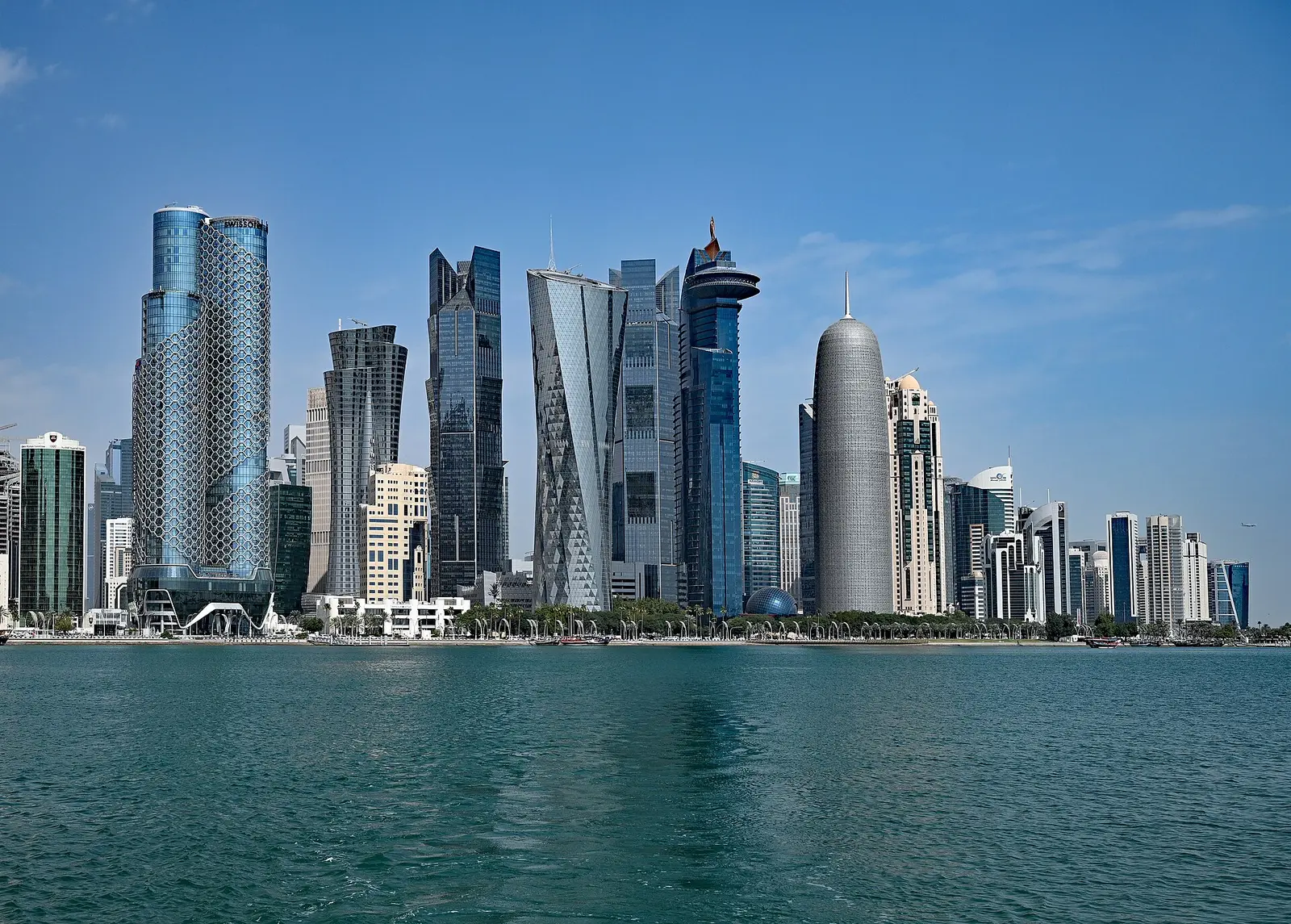 Doha West Bay towers rising above the bay on a clear day
